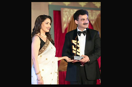 Dr. Sudhir Bhola received the International Excellence Award (was presented by "Padma Shri" Madhuri Dixit) for his work in the field of sexual medicines